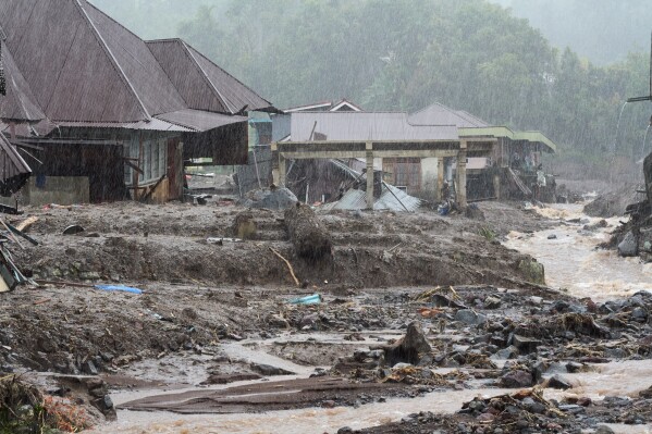 Flooding kills 69 in Sumatra as rescue crews search rivers for survivors Image